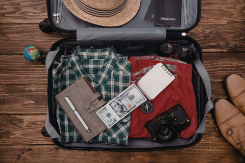 A suitcase filled with travel essentials.