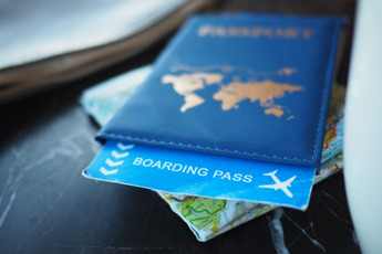 A Passport and Boarding Pass.