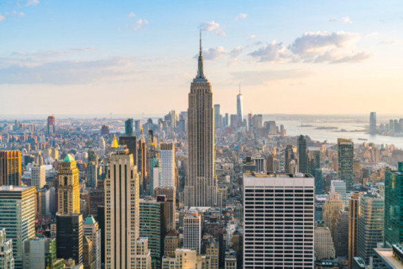 A drone shot of New York's skyline, focusing on the Empire State Building.